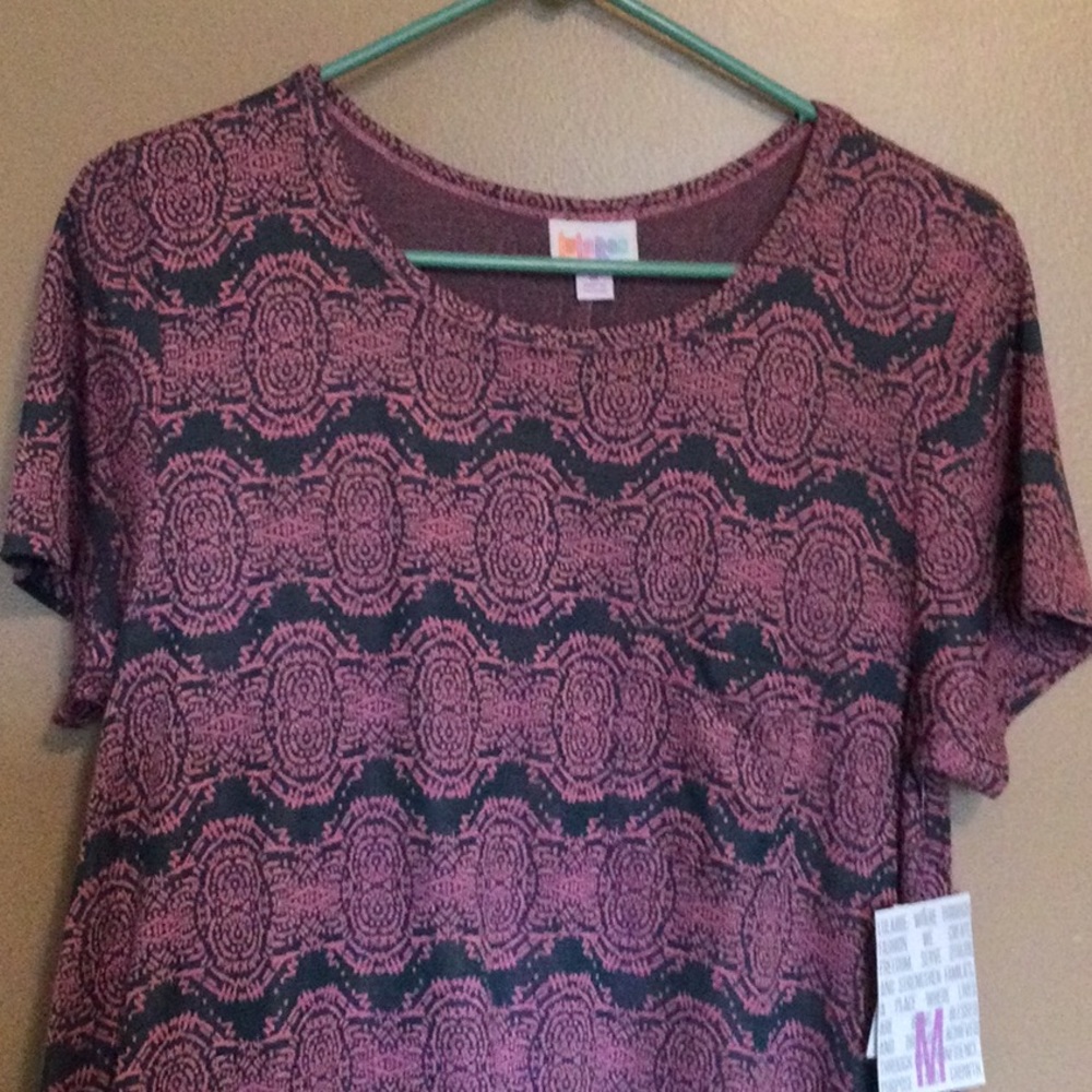 New with tags Lularoe Carly Dress, size Medium. Gray with pink pattern